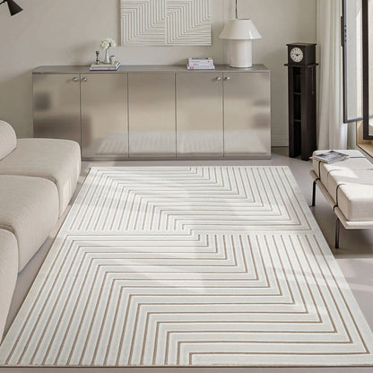Ivory taupe high low geometric line area rug styled in a calm modern living room