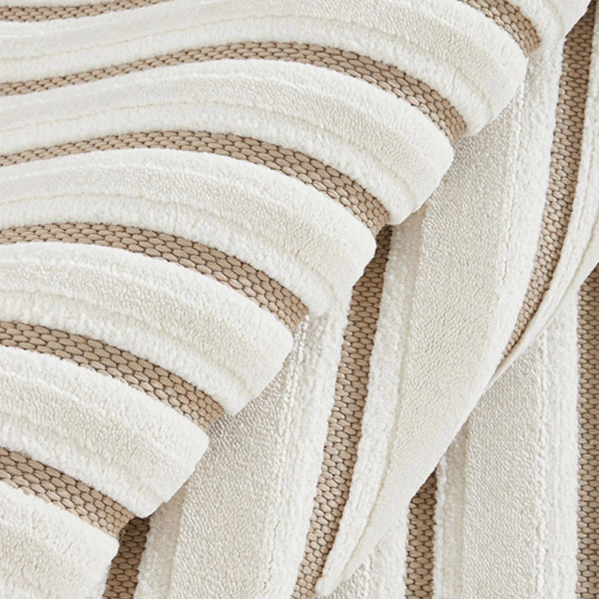 Ivory taupe high low geometric line rug showing raised pile and recessed woven detail