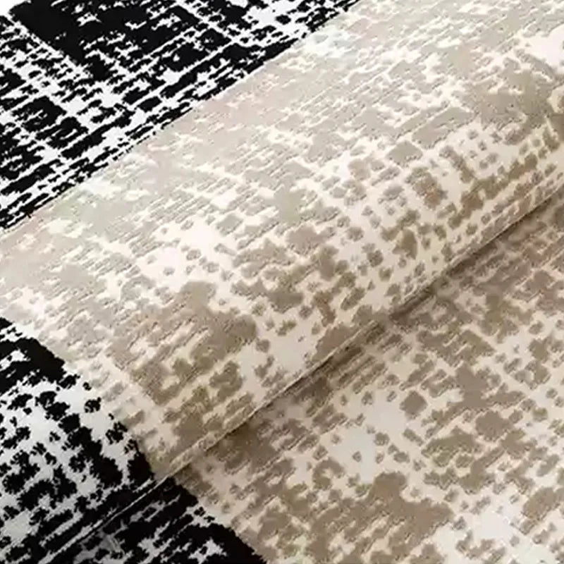 Close-up of layered rugs showcasing beige and black patterns with intricate texture and premium craftsmanship #color_beige