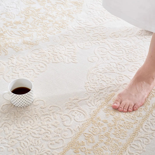 Soft beige Persian-style rug for barefoot comfort with textured surface and cozy home setting