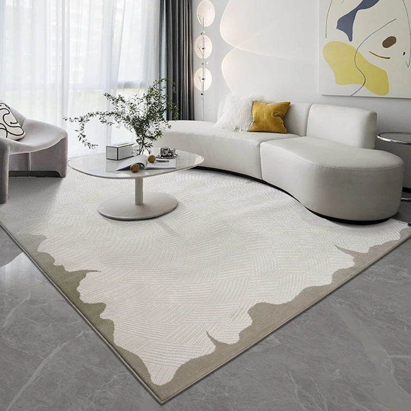 Contemporary 3D woven area rug with an abstract border design and textured geometric pattern in beige and gray, featuring a plush feel and anti-slip backing, enhancing a modern living room aesthetic
