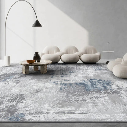 Modern blue and grey area rug with a textured abstract design, perfect for minimalist or contemporary living spaces #color_gray