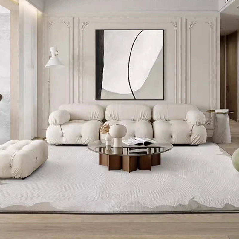 Modern luxury 3D woven area rug in a neutral beige and white tone, featuring a textured pattern, soft plush feel, and anti-slip backing, perfectly complementing a stylish living room décor