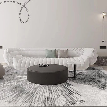 A minimalist white living room with a sunburst-patterned gray rug, creating a stylish and elegant centerpiece #texture_Solar Bloom
