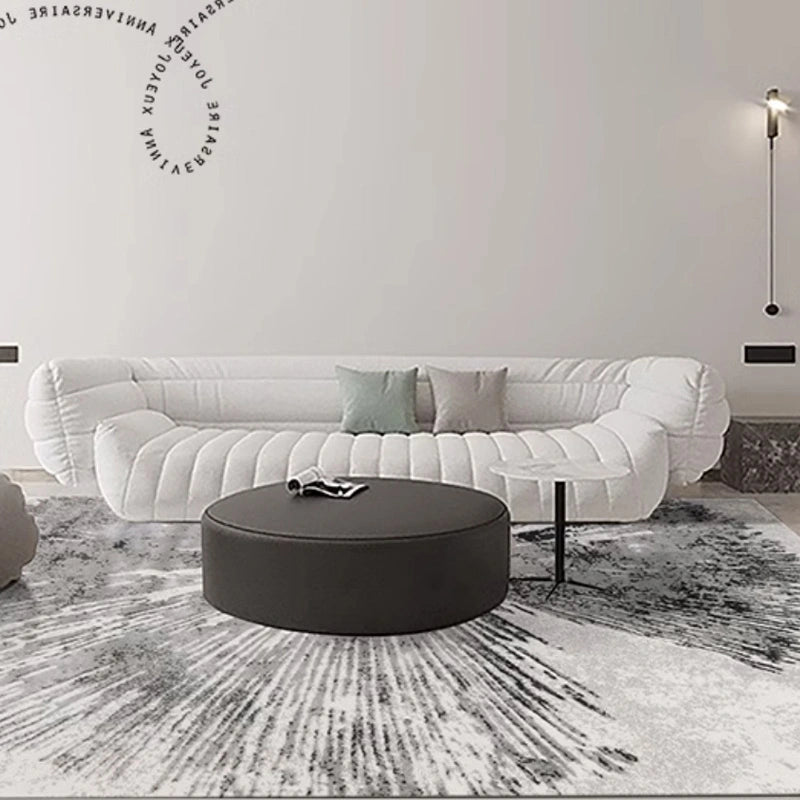 A minimalist white living room with a sunburst-patterned gray rug, creating a stylish and elegant centerpiece #texture_Solar Bloom