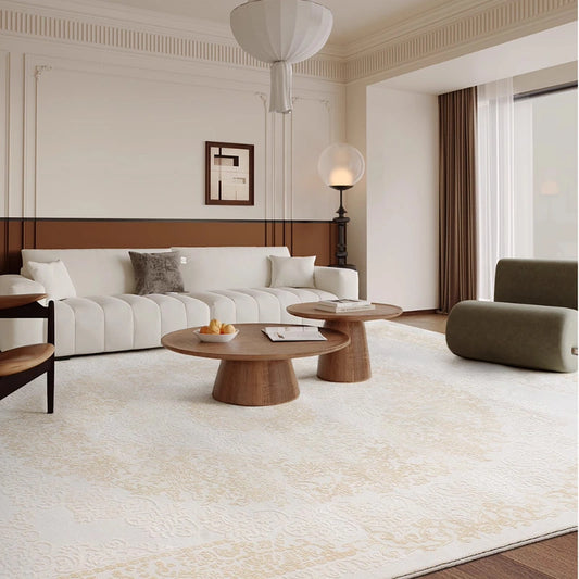 Cozy living room with a luxury Persian rug in beige and gold patterns, complemented by modern minimalist furniture #color_beige