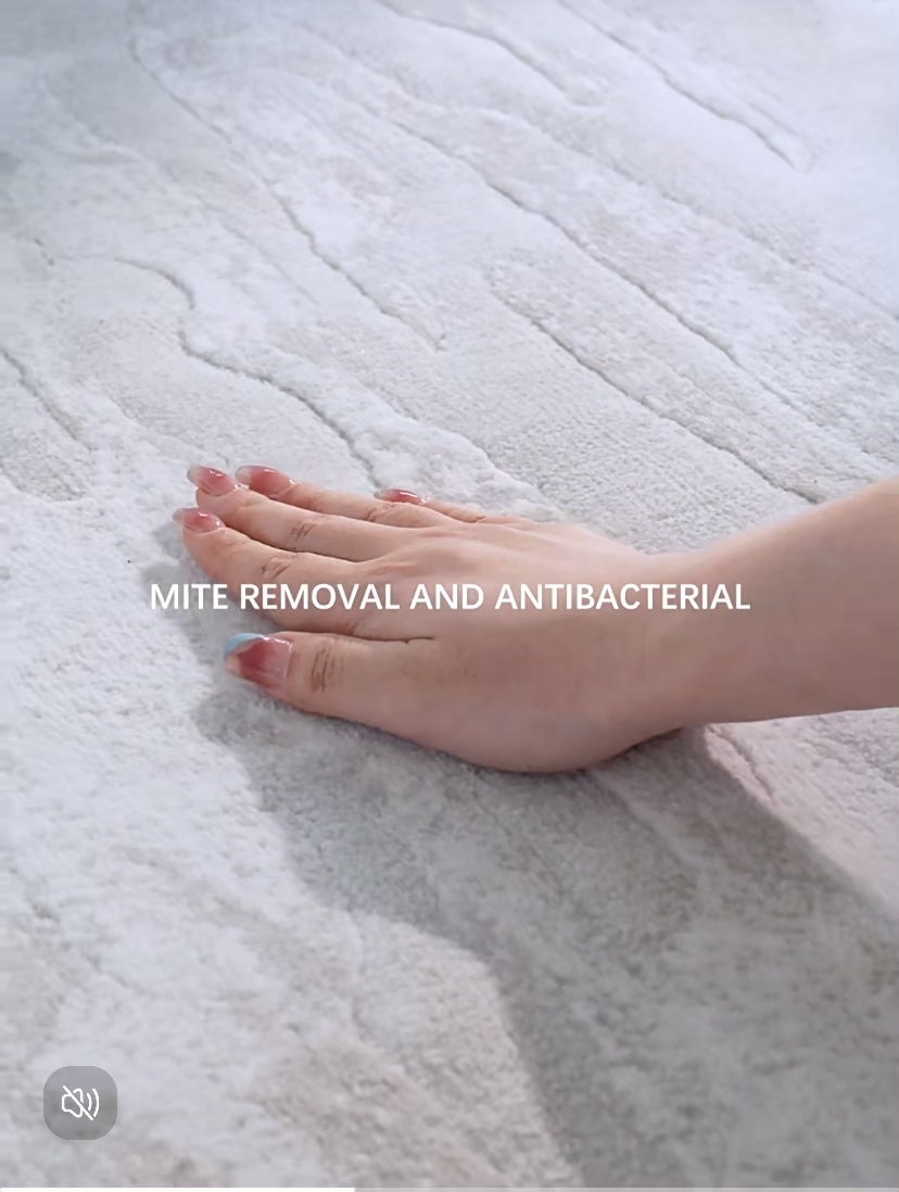 Load video: Luxurious jacquard rug crafted with 1.6 million antimicrobial stitches, eco-friendly jute backing, and a plush feel for modern homes