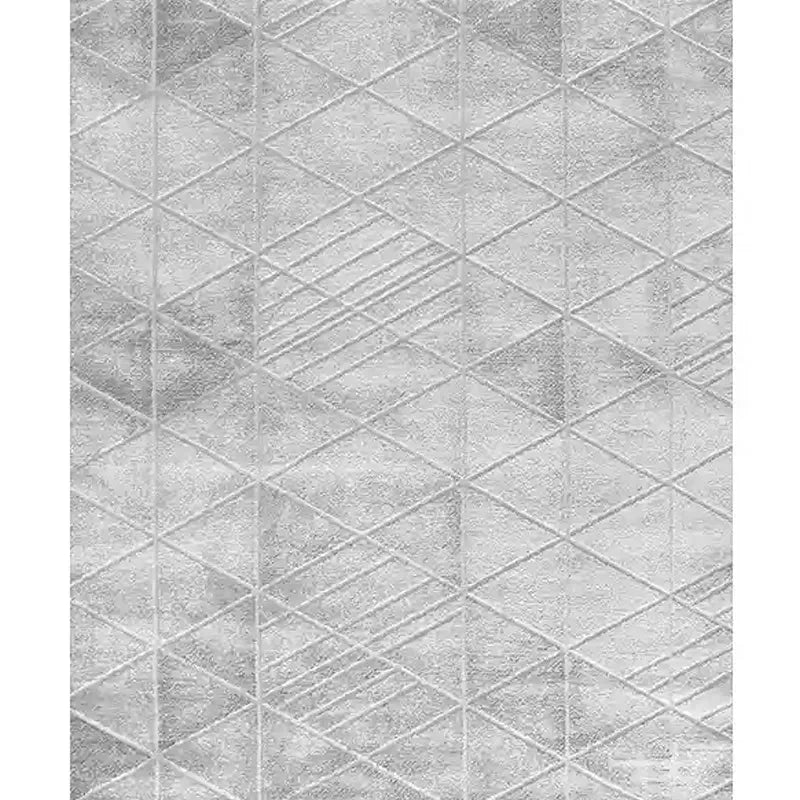 Full view of a grey geometric-patterned rug featuring intricate triangular and linear designs, showcasing its modern and minimalist aesthetic