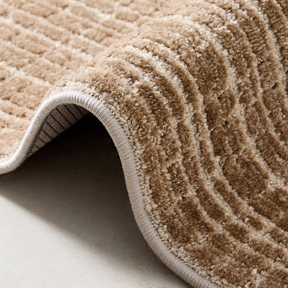 Close-up of the Siena rug edge showing dense raised pile and woven linear texture