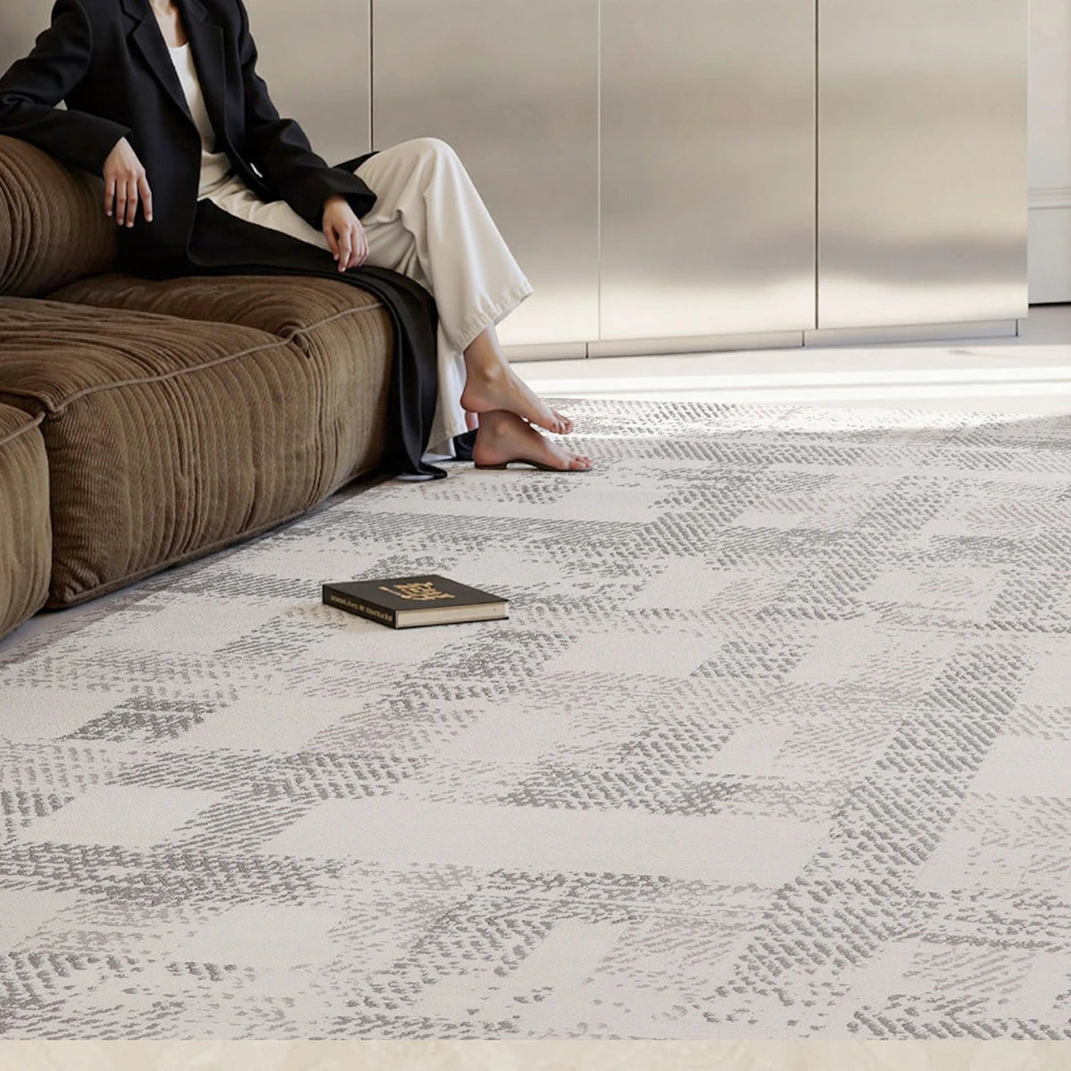 soft cream geometric area rug in a modern living room by Tervannor