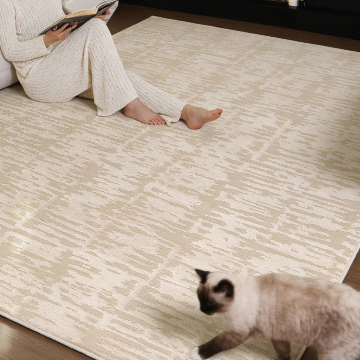 soft cream textured area rug in a cozy living room with neutral tones, thick dense feel and comfortable underfoot