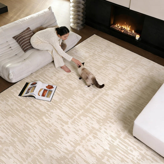 soft cream textured area rug in a cozy living room with a comfortable everyday feel