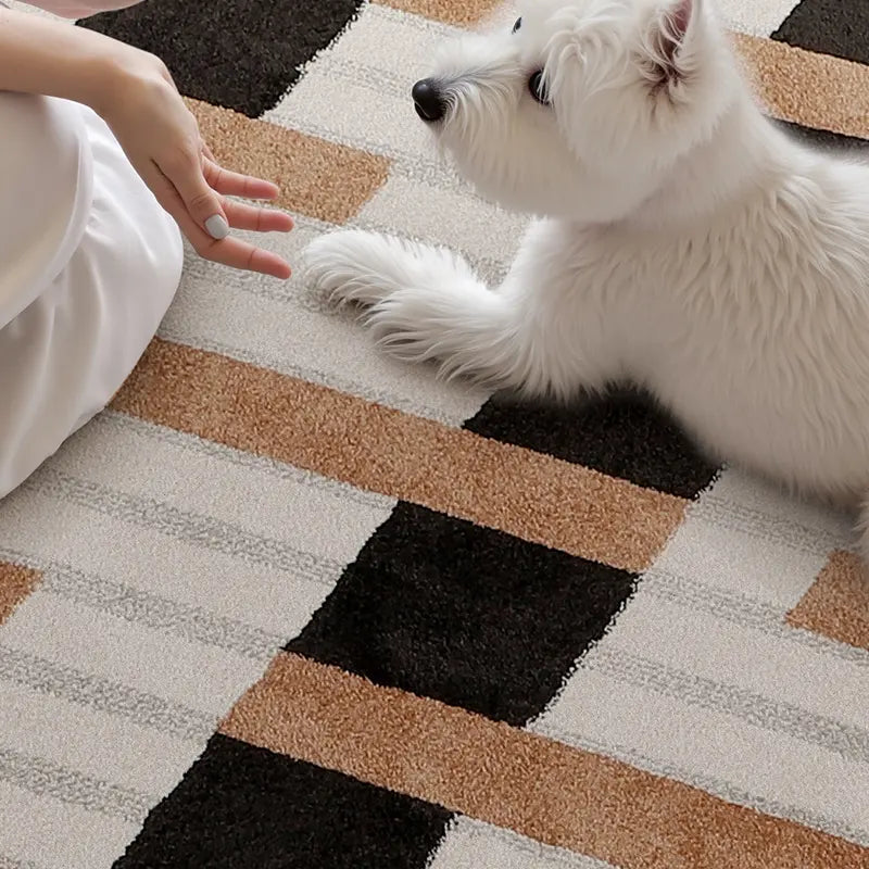 Close-up of a white dog laying on a soft, geometric-patterned rug with a warm modern design