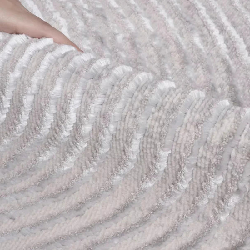 Close-up of the soft textured surface of a gray rug, showcasing its plush fabric and detailed craftsmanship #texture_Harmonic Circle