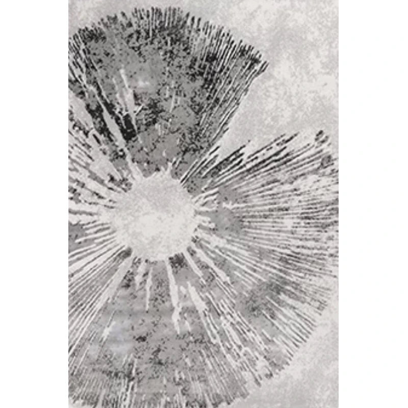 A close-up view of a sunburst-patterned gray rug, showcasing its bold design and intricate details #texture_Solar Bloom