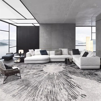 Sunburst-patterned gray rug in a modern minimalist living room, adding elegance and luxury to the space #texture_Solar Bloom