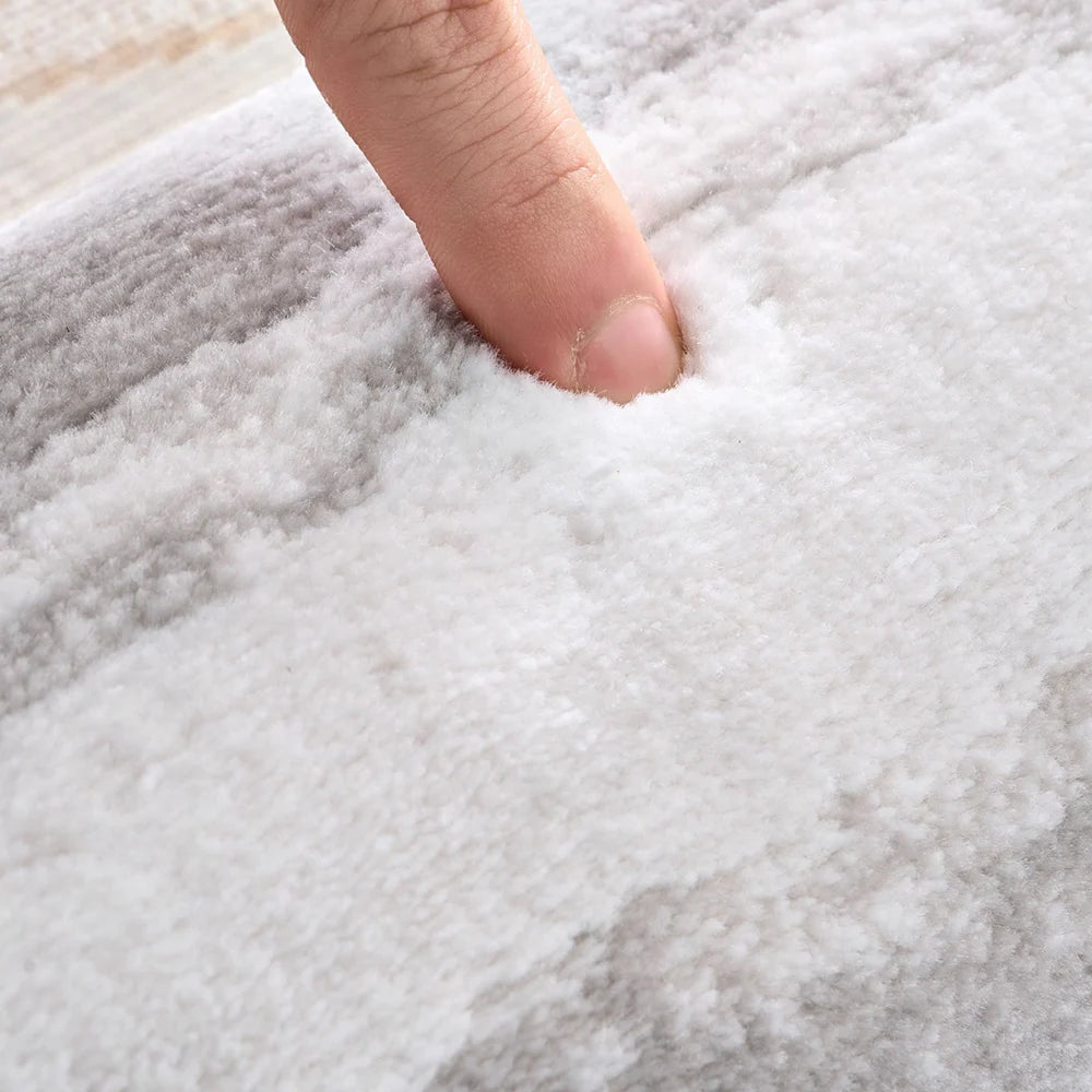 Close-up of a thick and soft area rug showing plush texture and comfortable underfoot feel