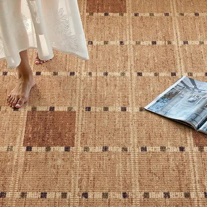 Wool blend area rug with warm neutral plaid design, 12mm thick soft loop texture, hand-bound edge